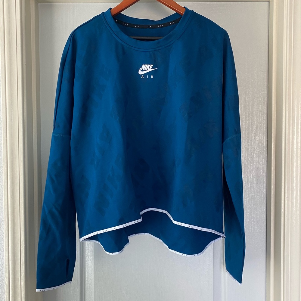 Nike woman’s shirt color blue size 2XL